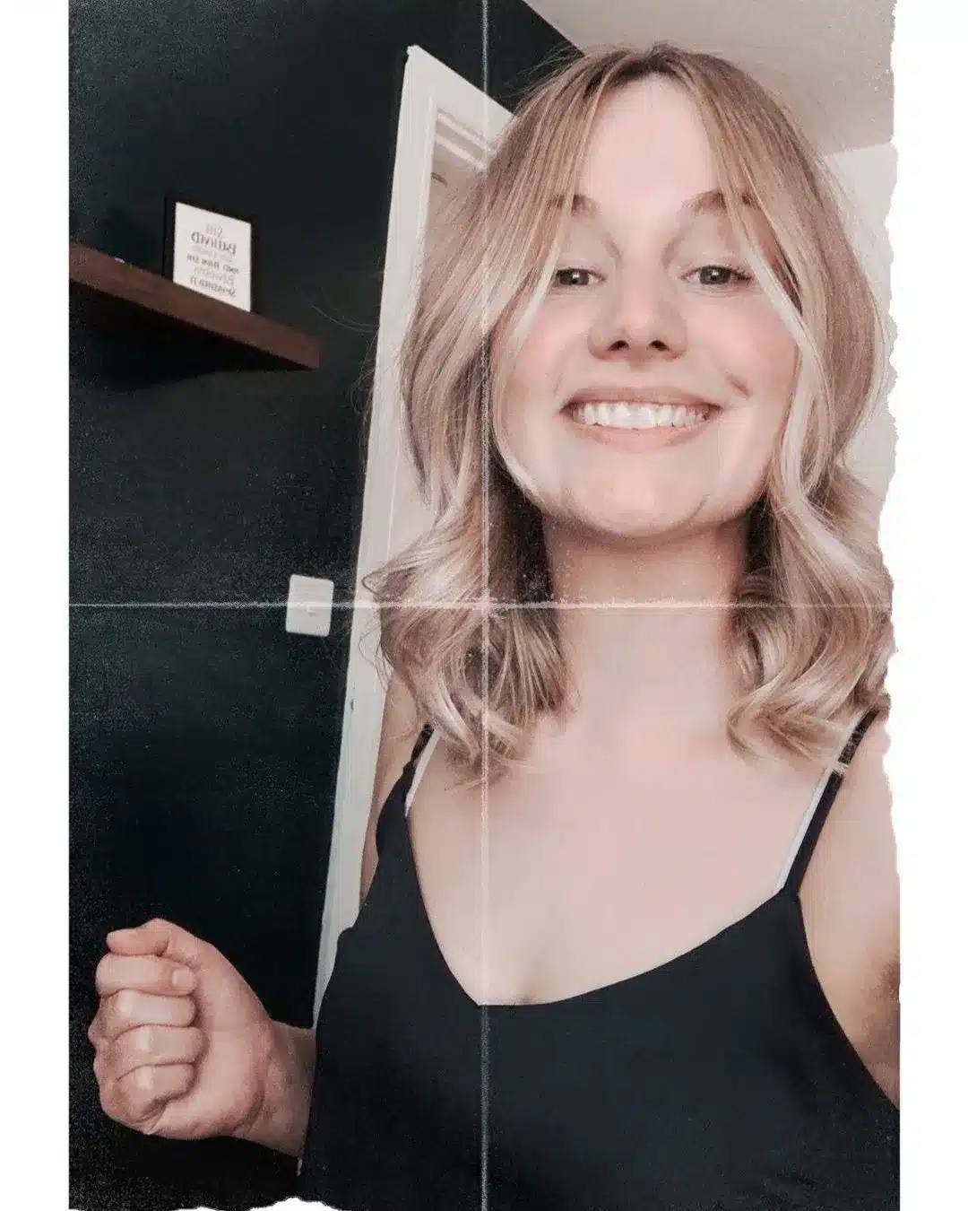 Smiling blonde woman portrait indoors